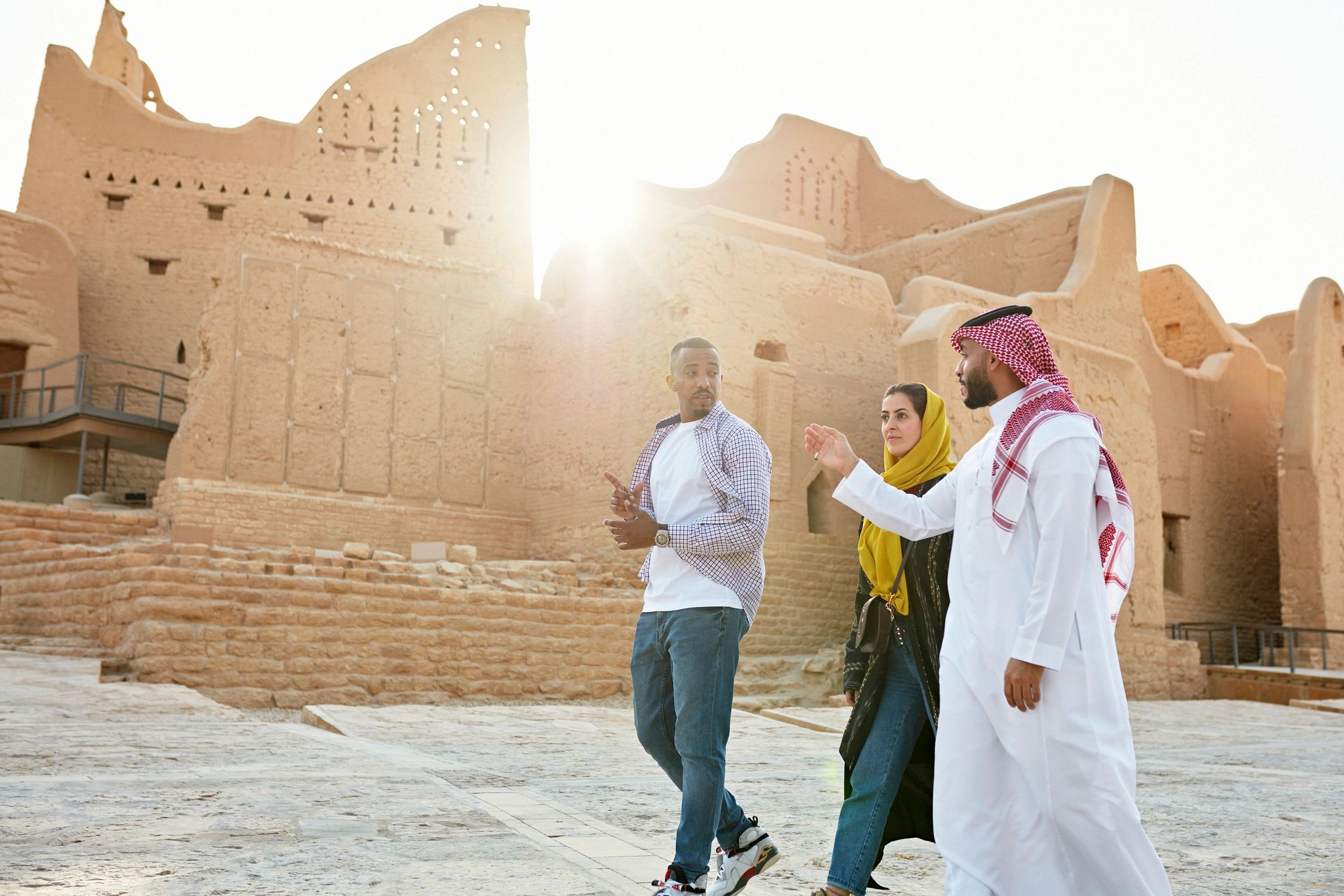 Guide interpreting archaeological ruins for visitors