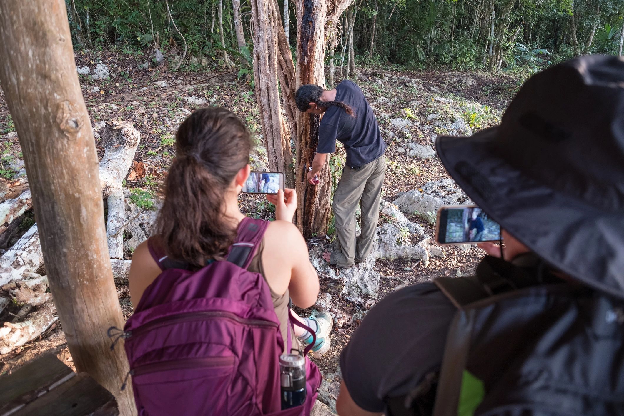 Guide sharing cultural knowledge with visitors outdoors