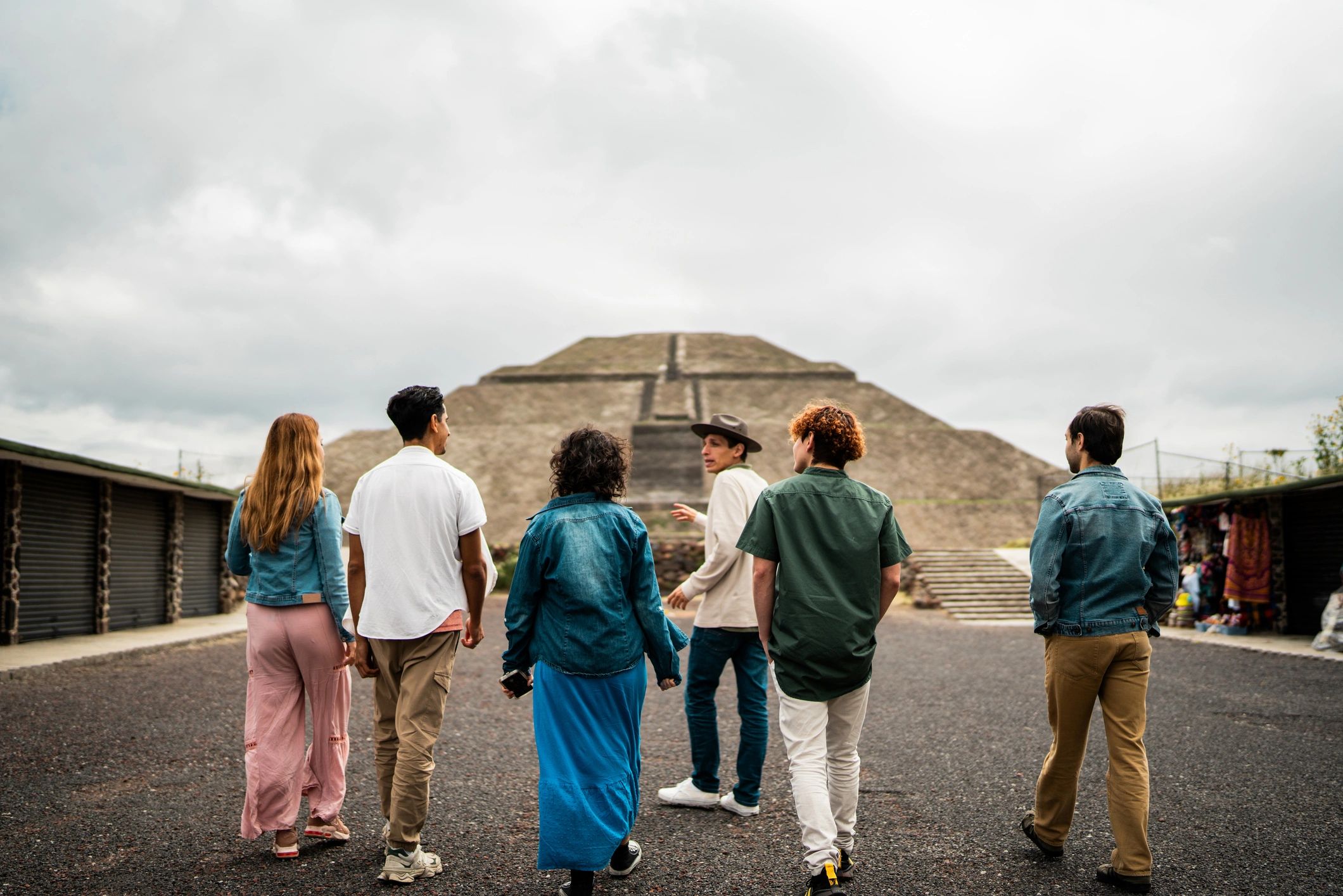Archaeology guide sharing site history with visitors